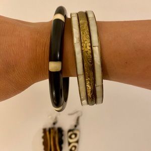 Two bangles and a pair of earrings